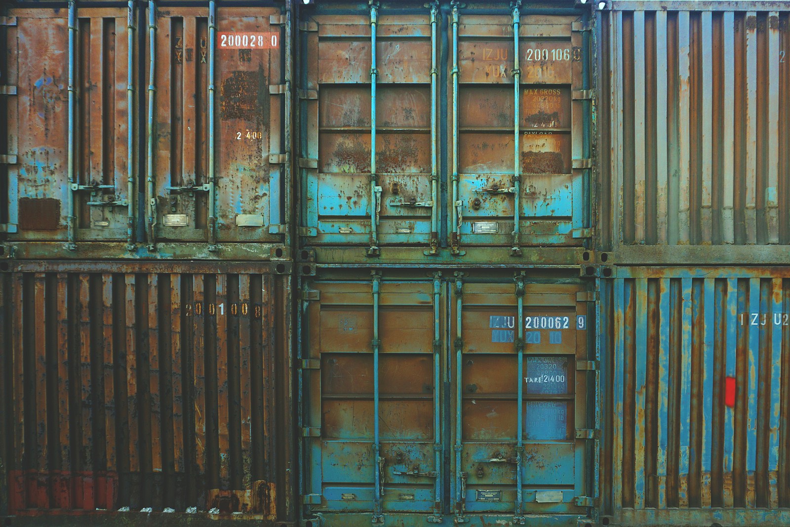six blue freight containers
